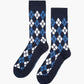 Navy blue sock with a blue and white argyle pattern 