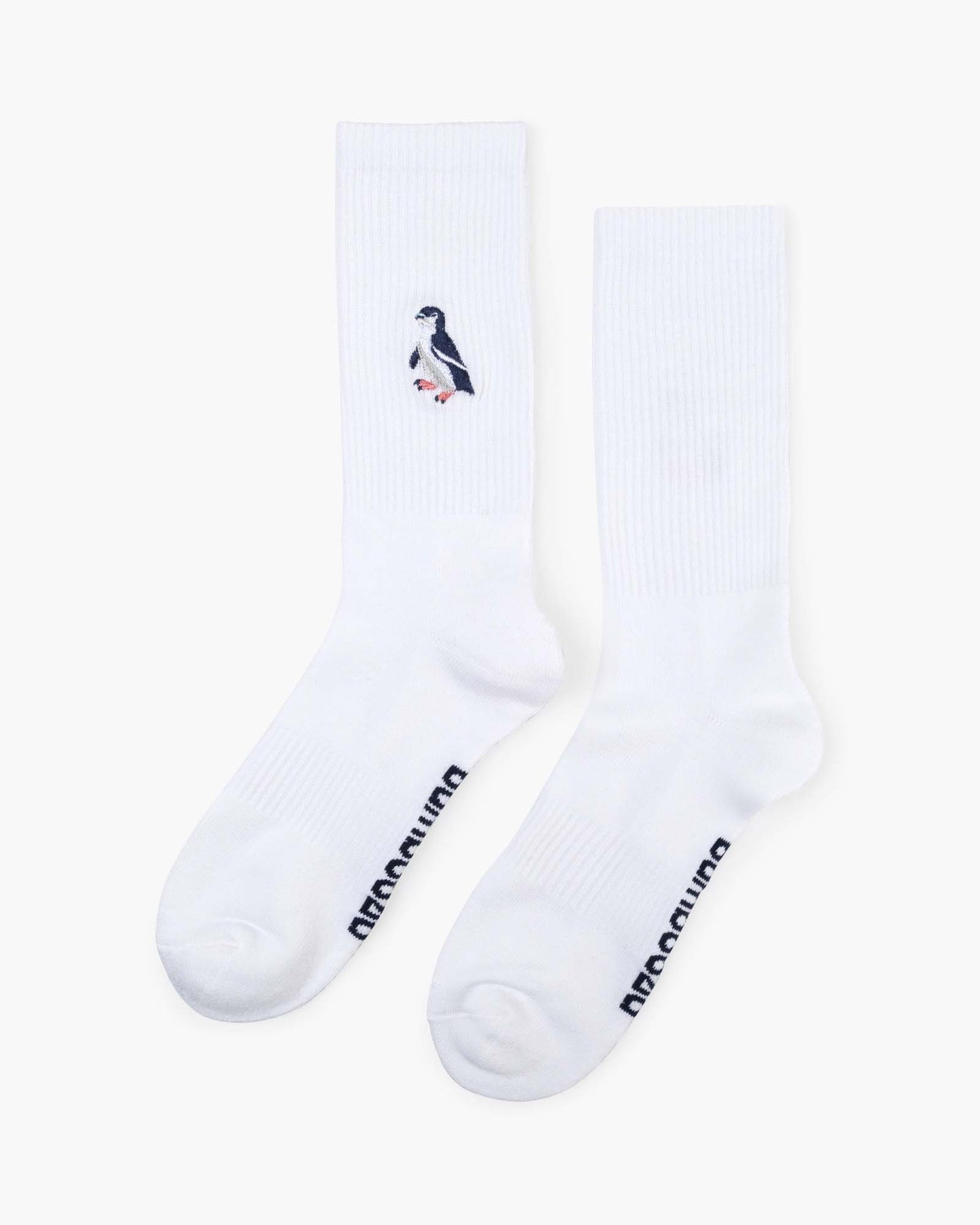 white sports sock with a penguin design