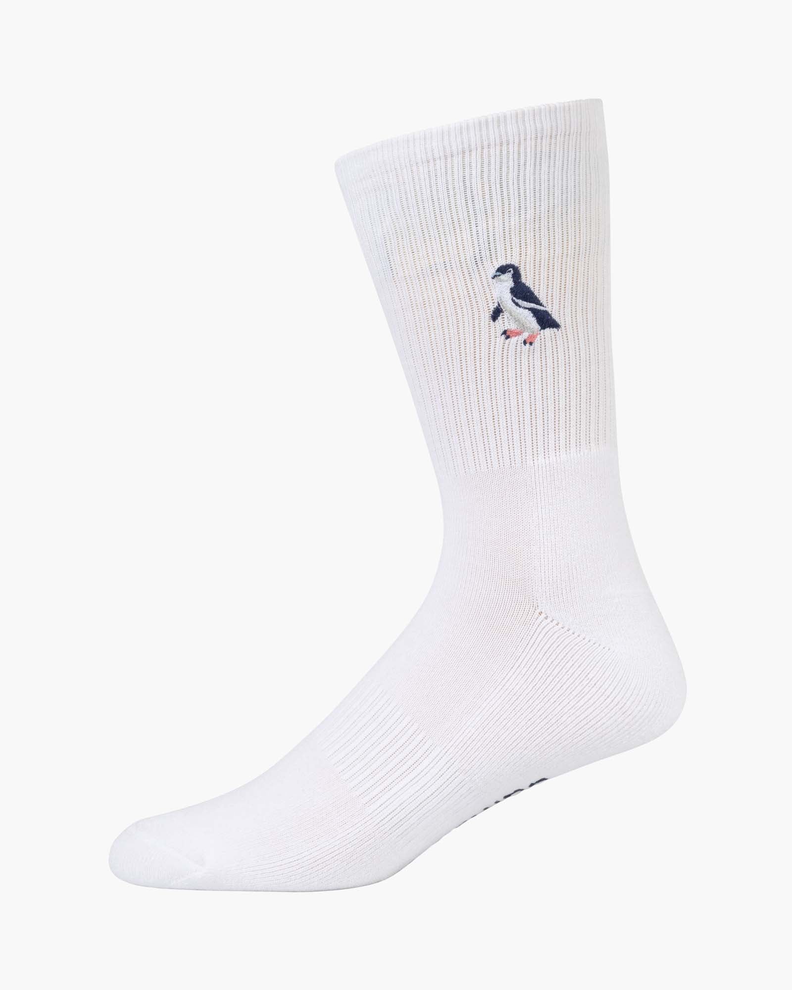 white sports sock with a penguin design