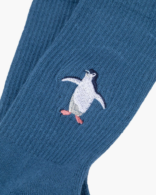 denim sports sock with a penguin design