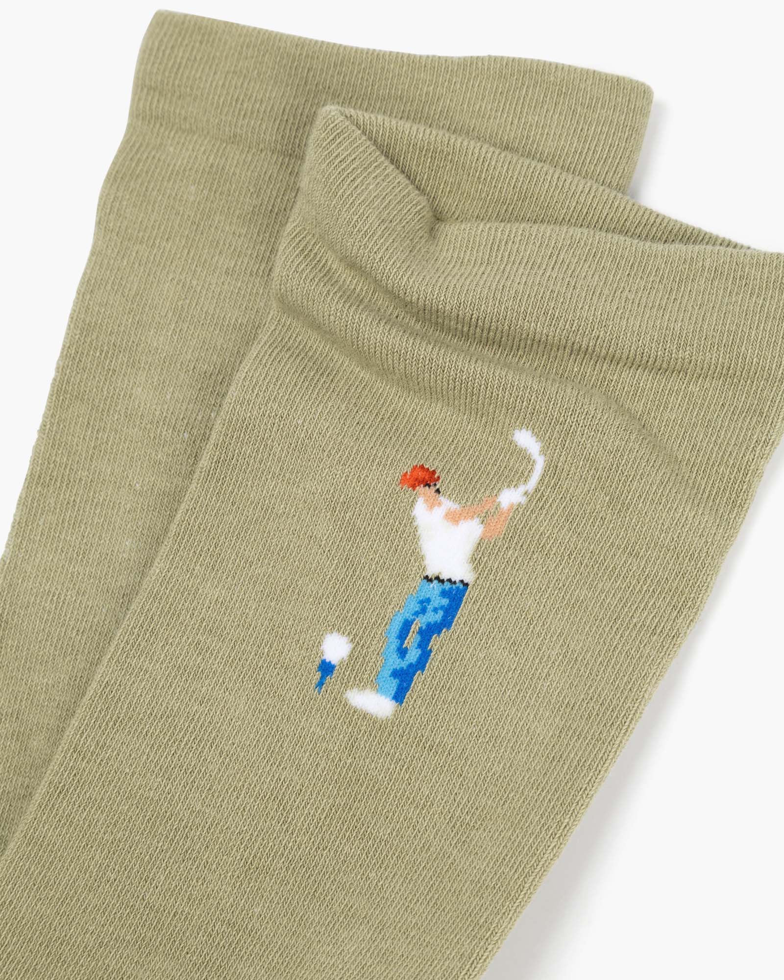 sage sock with a golf-themed design