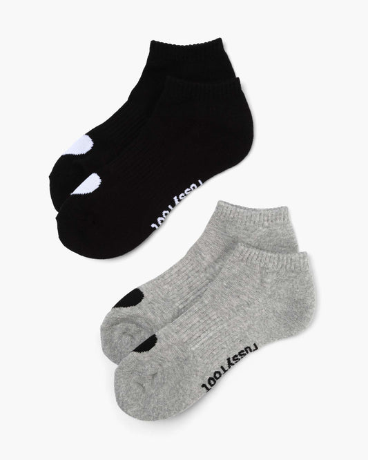 Two pairs of ankle socks, one black and one grey, with love heart print design 