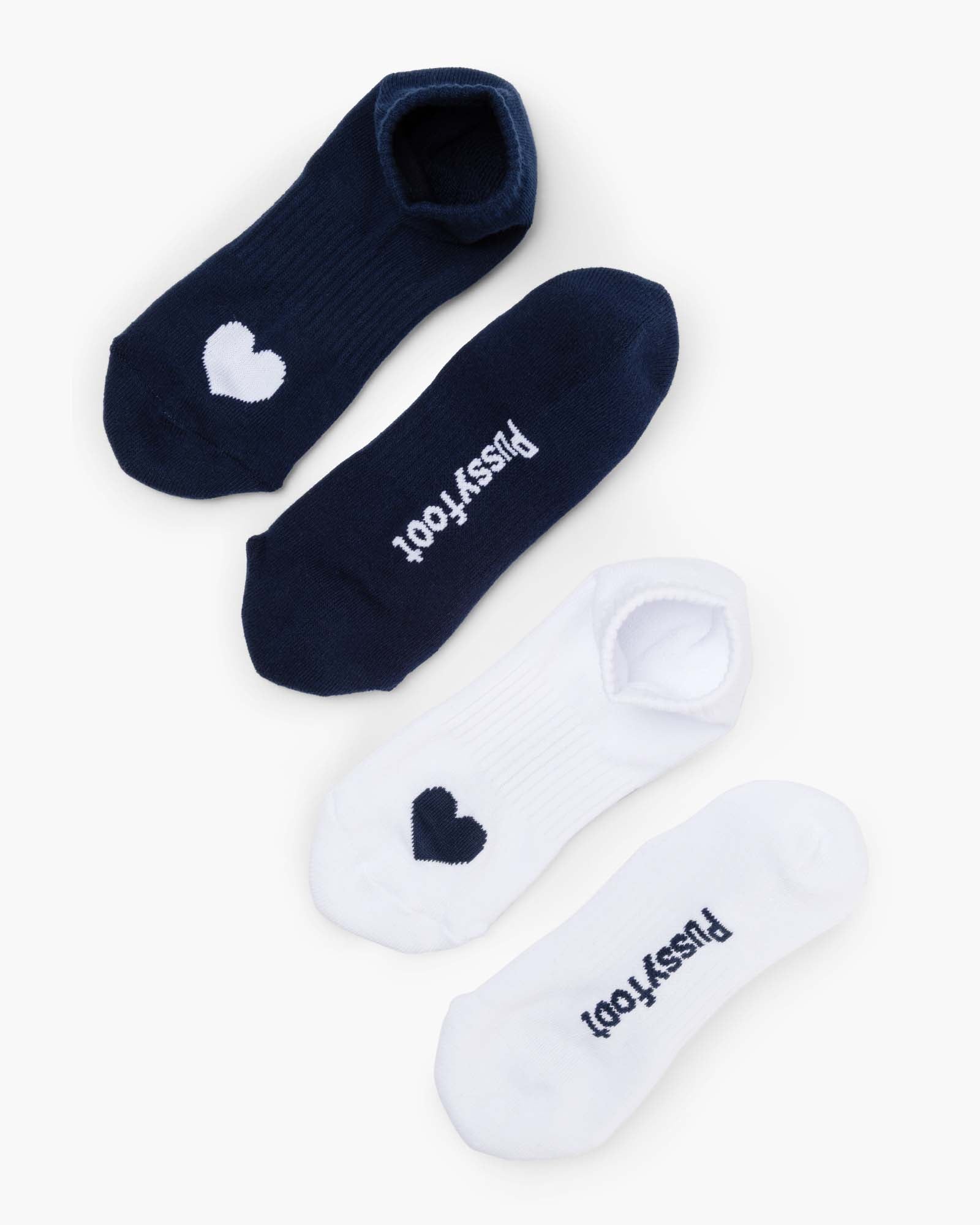 Two pairs of ankle socks, one navy and one white, with love heart print design