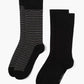 Two pairs of socks one striped and one plain sock in black