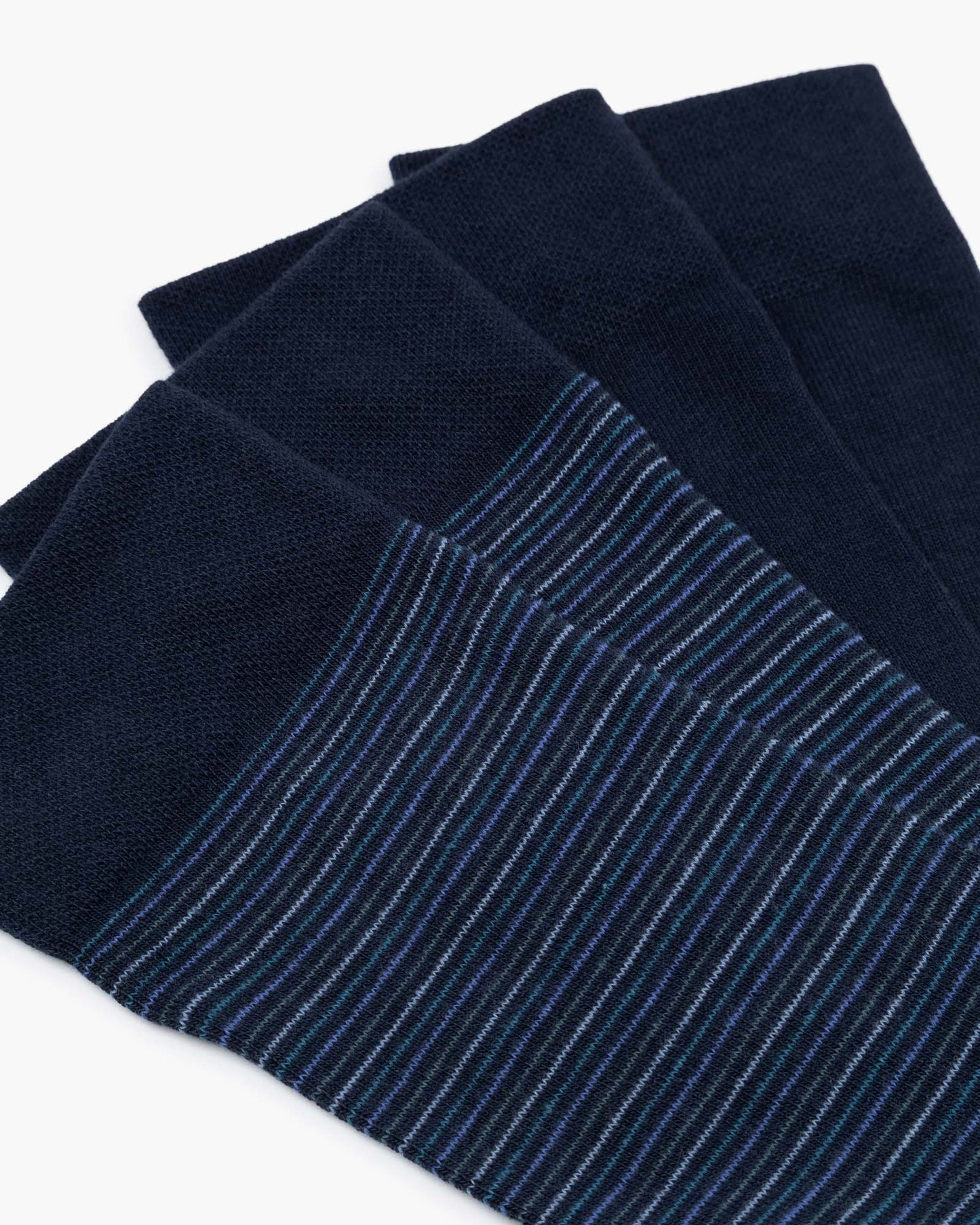 Two pairs of socks one striped and one plain sock in navy