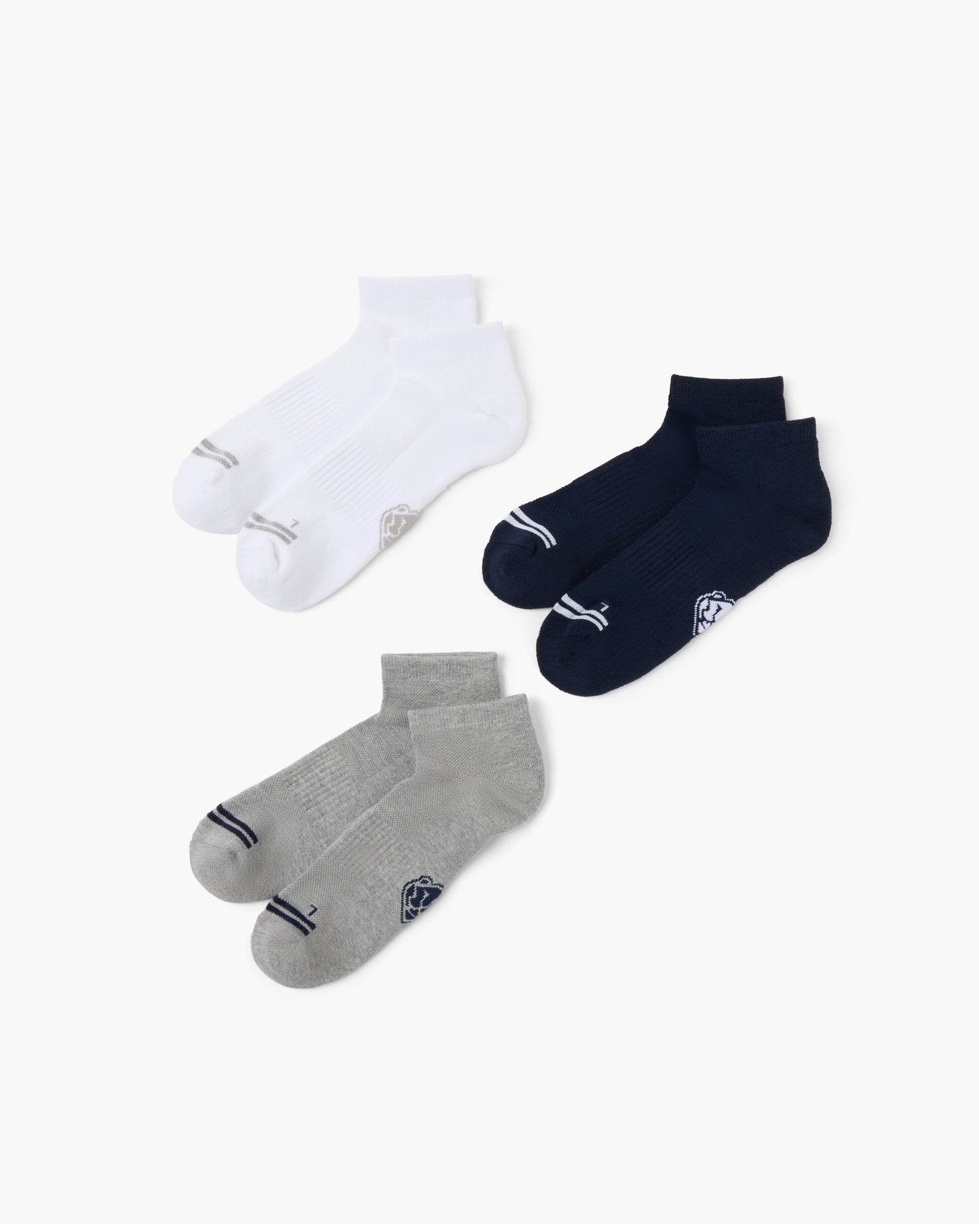 Three pairs of sport ankle socks in white, grey, and navy