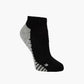 A single low-cut ankle sport sock in black with grey accents on the heel