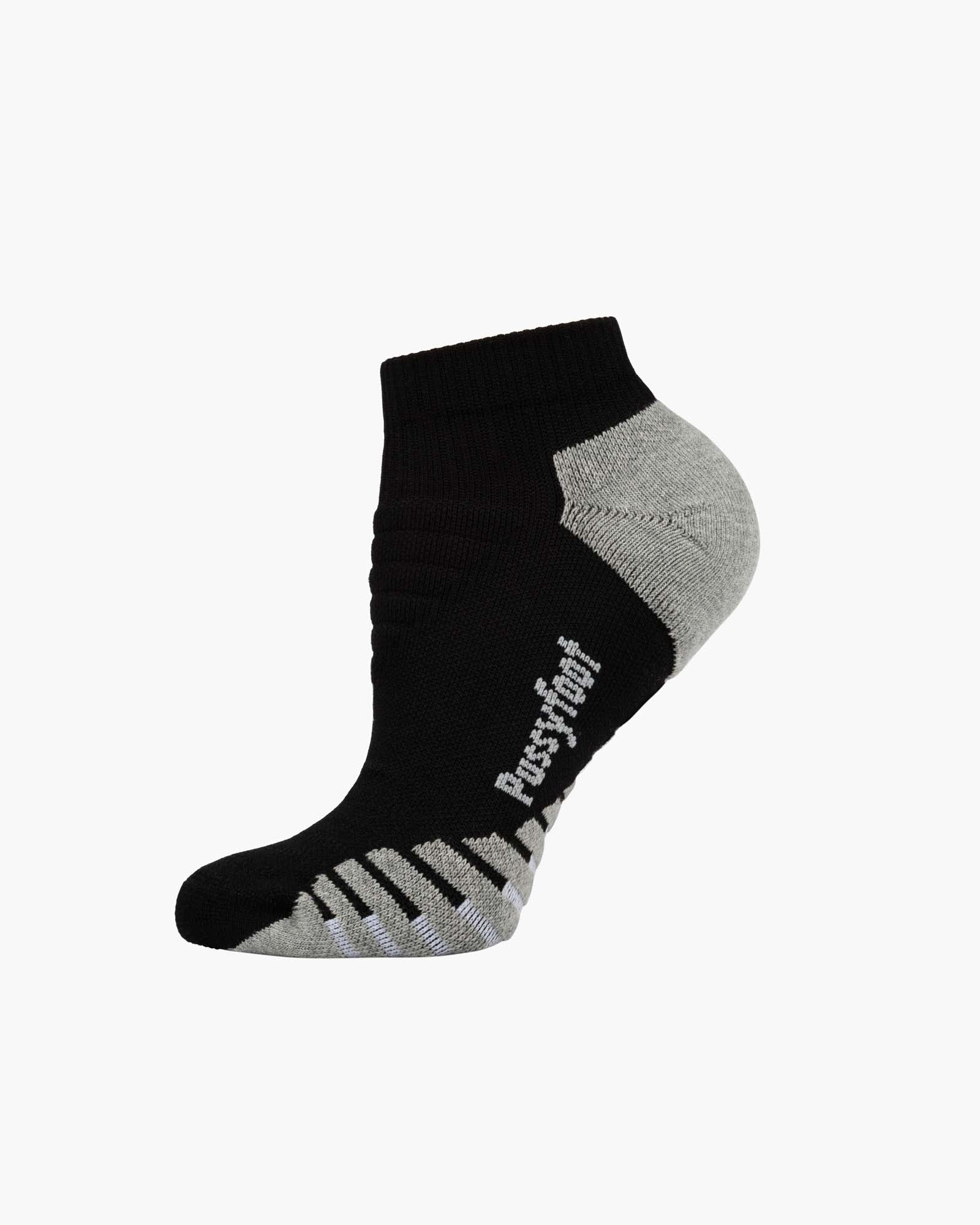 A single low-cut ankle sport sock in black with grey accents on the heel