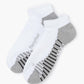 A single low-cut ankle sport sock in white with grey accents on the heel